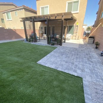 Armando Lawn Maintenance - a patio with a pergolated area - Lawn Services Near Me Armando Lawn Maintenance - a patio with a pergolated area - Lawn Services Near Me