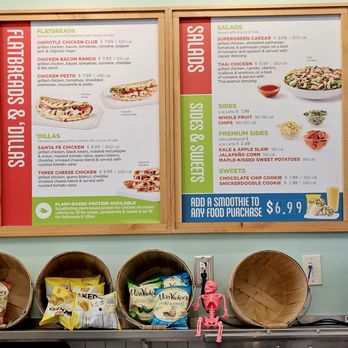 Tropical Smoothie Cafe - Part of the menu on the wall. - Juice Bars & Smoothies Near Me - Pasadena, Texas
