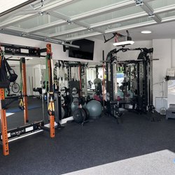 Rich Roe Personal Training - Squat rack, hi-lo dual cable system, stability ball, Olympic bar, bumper plates.