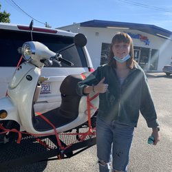 National Pawn and Jewelry - Me at the store after loading scooter.