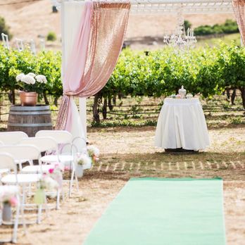 Seeker Vineyard - a wedding ceremony set up in a vineyard - Wineries Near Me - San Martin, California Seeker Vineyard - a wedding ceremony set up in a vineyard - Wineries Near Me - San Martin, California
