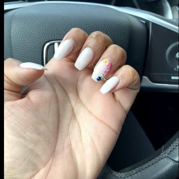 Sunset Nails - Nailed the stiletto shape and the subtle nail art is so cute! - Nail Salons Near Me - San Francisco, California