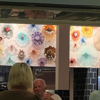 Perla Raw Bar - Inside of restaurant - feature wall - Seafood Near Me - Wilmington, North Carolina Perla Raw Bar - Inside of restaurant - feature wall - Seafood Near Me - Wilmington, North Carolina