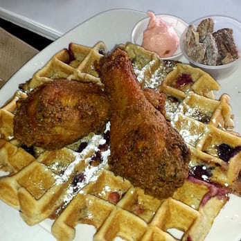 Dame's Chicken & Waffles - Blueberry waffles with drumsticks and strawberry schmear and candied pecans - Southern Near Me - Durham, North Carolina Dame's Chicken & Waffles - Blueberry waffles with drumsticks and strawberry schmear and candied pecans - Southern Near Me - Durham, North Carolina