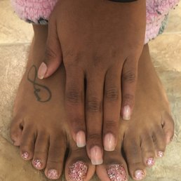 Gel polish on toes and clear dipping acrylic on nails with two tips.