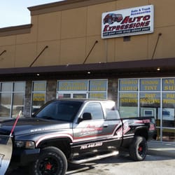 Auto Expressions - Our old grey truck with our new custom pain and accessories!