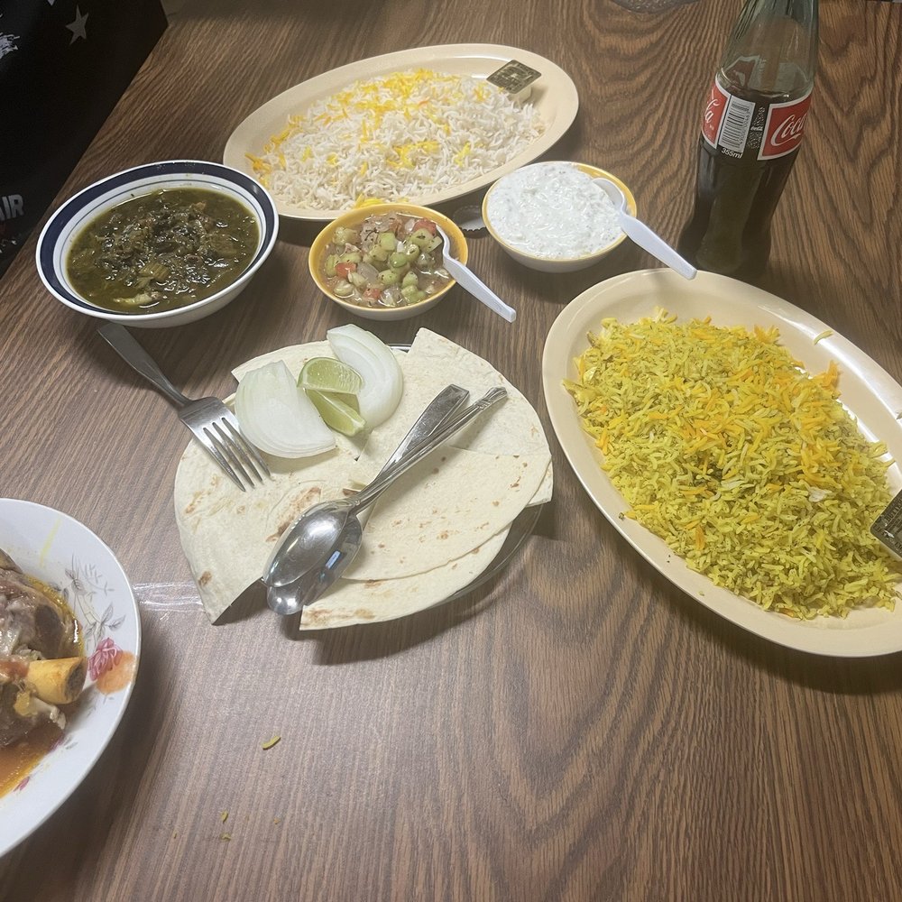 Lamb shank Ghormeh Sabzi (Green herbs stew with rice) Lamb shank Ghormeh Sabzi (Green herbs stew with rice)