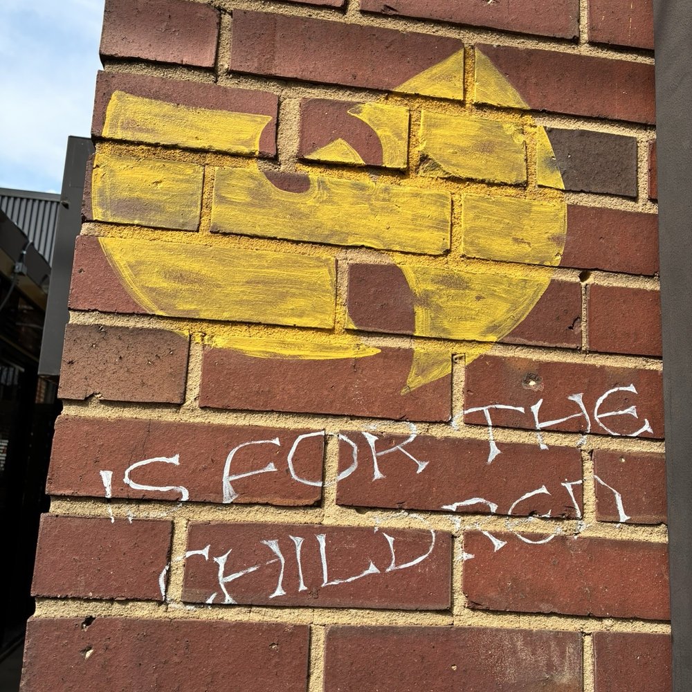 VINYL - Wutang sign outside - New American Near Me - Charlotte, North Carolina VINYL - Wutang sign outside - New American Near Me - Charlotte, North Carolina