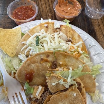 Ernestos's Taco Shop - Ground Beef Tacos, lettuce, cheese and crunchy shell.. and add some hot sauce - Mexican Near Me - Cutler Bay, Florida Ernestos's Taco Shop - Ground Beef Tacos, lettuce, cheese and crunchy shell.. and add some hot sauce - Mexican Near Me - Cutler Bay, Florida