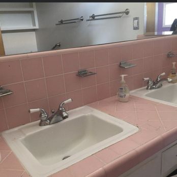 Luxury Building Services - My old bathroom cabinets and the tile - General Contractors Near Me