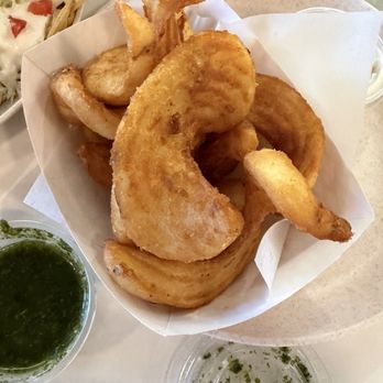 Uncle Mac’s Kitchen - Tom Yum Sidewinder Fries - Seafood Near Me - Gardena, California Uncle Mac’s Kitchen - Tom Yum Sidewinder Fries - Seafood Near Me - Gardena, California