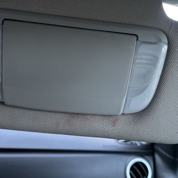 Dirty Desert Detail - Before: How did her lipstick not make it onto her lips? - Auto Detailing Near Me