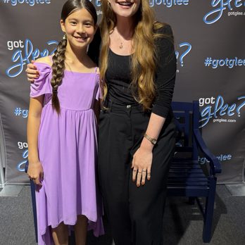 Glee Music Academy - Our Voice Teacher Leslie poses with one of her brilliant students after the 2025 Kickoff to Summer Recital! - Musical Instruments & Teachers Near Me - Lake Forest, California