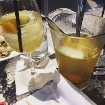 Earls Kitchen + Bar - pitcher of white peach sangria - New American Near Me - Miami, Florida