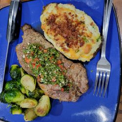 Freshly Made By Layha - Twice baked, fully loaded potato, chimichurri steak, and brussel sprouts