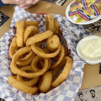 Cruiser Cafe - Basket of crispy sweet onion rings $8.99 but good amount and yummy. - American Near Me - Eatonville, Washington