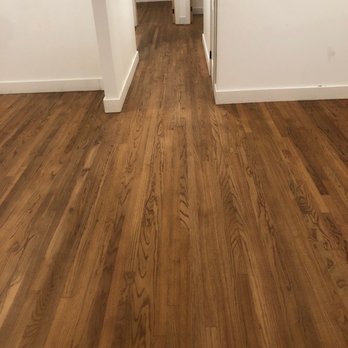 Aggressive Wood Flooring - a narrow hallway - Flooring Near Me
