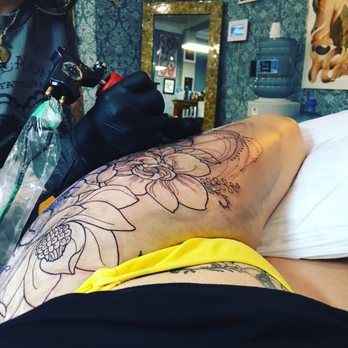 Black Cat Tattoo Studio - My wife getting tattooed by Kai, they gave her a pillow to keep comfortable! - Tattoo Near Me - Honolulu, Hawaii Black Cat Tattoo Studio - My wife getting tattooed by Kai, they gave her a pillow to keep comfortable! - Tattoo Near Me - Honolulu, Hawaii