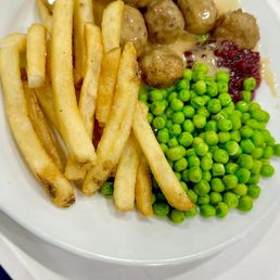 Swedish meatballs with fries and peas