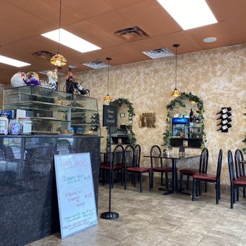 Mezzaluna Pizzeria At Halifax - Inside decor - Pizza Near Me - Ormond Beach, Florida Mezzaluna Pizzeria At Halifax - Inside decor - Pizza Near Me - Ormond Beach, Florida