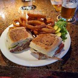 Cubana sandwich with the best onion rings I've ever had! Cubana sandwich with the best onion rings I've ever had!