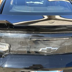 Back of the car looks like there is smeared mud on it