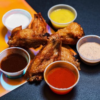 Atomic Wings - BedStuy - a variety of dipping sauces - Chicken Wings Near Me - Brooklyn, New York