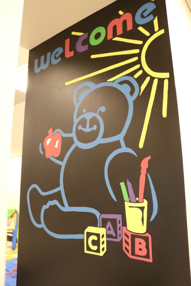 Wee Care Preschool Logo