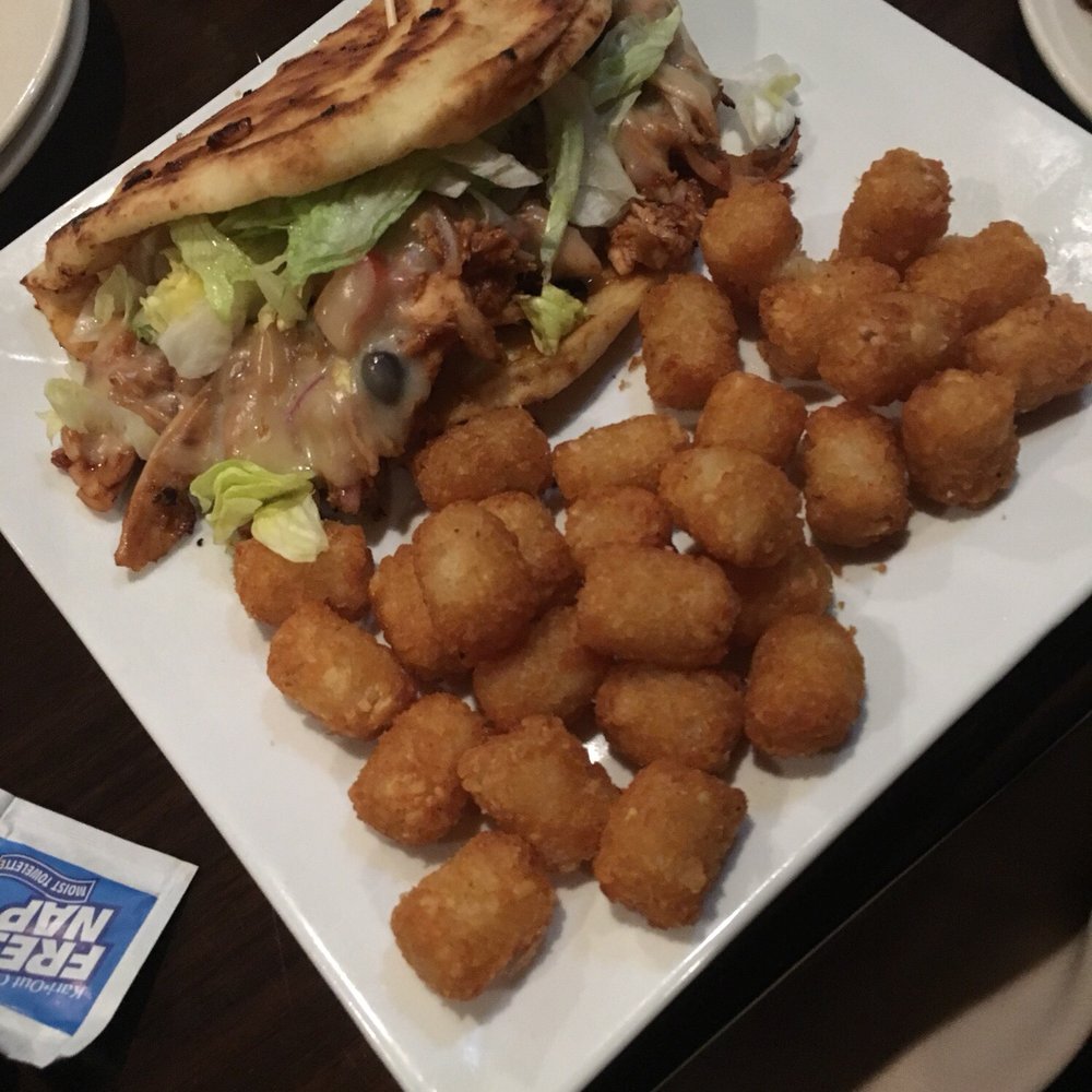 The Hidden Still - Sedona chicken sandwich stuffed with avocado, corn and black bean salsa, lettuce, cheese with a side of more crispy tater tots! - Bars Near Me - Ellington, Connecticut The Hidden Still - Sedona chicken sandwich stuffed with avocado, corn and black bean salsa, lettuce, cheese with a side of more crispy tater tots! - Bars Near Me - Ellington, Connecticut