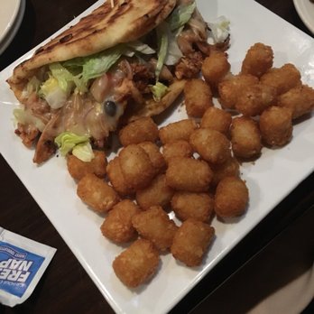 The Hidden Still - Sedona chicken sandwich stuffed with avocado, corn and black bean salsa, lettuce, cheese with a side of more crispy tater tots! - Bars Near Me - Ellington, Connecticut The Hidden Still - Sedona chicken sandwich stuffed with avocado, corn and black bean salsa, lettuce, cheese with a side of more crispy tater tots! - Bars Near Me - Ellington, Connecticut
