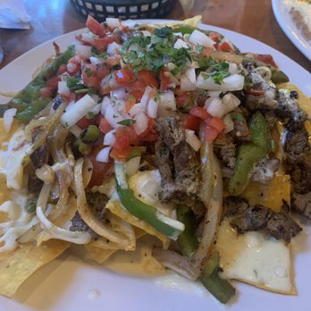 Sr. Tequila Mexican Grill - Fajita Steak Nachos - Mexican Near Me - Clermont, Florida Sr. Tequila Mexican Grill - Fajita Steak Nachos - Mexican Near Me - Clermont, Florida