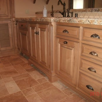 Orth Construction & Design - a bathroom with a marble countertop - General Contractors Near Me - Bishop, California Orth Construction & Design - a bathroom with a marble countertop - General Contractors Near Me - Bishop, California