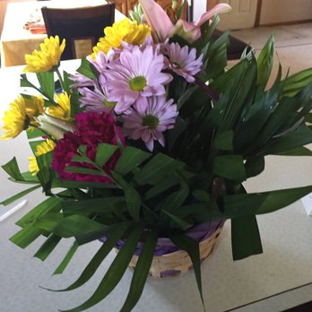 Stems N Such - The horrible attempt at matching the expected gift. No eggs, a plastic basket, no roses, and greenery as a filler. - Florists Near Me - Kouts, Indiana Stems N Such - The horrible attempt at matching the expected gift. No eggs, a plastic basket, no roses, and greenery as a filler. - Florists Near Me - Kouts, Indiana