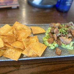 Dos Olivos Market Harlingen - Texas Iberico Pork Belly Chicharron $12 - avocado, pork belly, spicy margarita vinaigrette, tortilla chips! Best thing I've eaten this year!