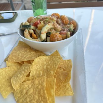 Frigate's Waterfront Bar & Grill - Tuna Sarachi salad bowl with chips - Seafood Near Me - North Palm Beach, Florida Frigate's Waterfront Bar & Grill - Tuna Sarachi salad bowl with chips - Seafood Near Me - North Palm Beach, Florida