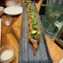 Treasure island roll. Fried shrimp, with salmon, guacamole and jalapeño