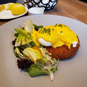 Boulevard - Fish feature item of the day. Sable fish made into a crab cake-like deliciousness with poached eggs and hollandaise - Seafood Near Me - Vancouver, British Columbia