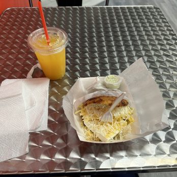 Arepas by Perla - A mixed cheese only Arepa and small passion fruit drink for $20.  Total rip off, plus I got sick after eating it. - Venezuelan Near Me - Houston, Texas