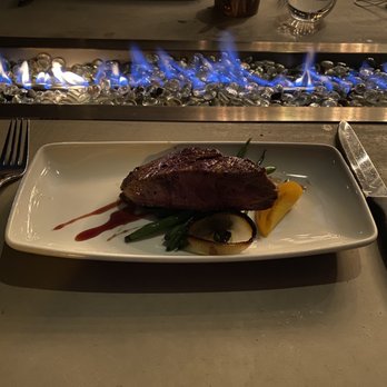 Coohills Restaurant - a plate of food on a table - French Near Me - Denver, Colorado Coohills Restaurant - a plate of food on a table - French Near Me - Denver, Colorado