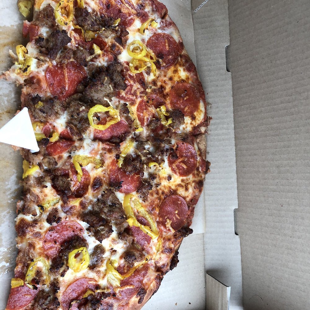 CoasT Pizza - Half of a large 3 topping pizza with Italian sausage, pepperoni, and banana peppers. - Pizza Near Me - Girdwood, Alaska CoasT Pizza - Half of a large 3 topping pizza with Italian sausage, pepperoni, and banana peppers. - Pizza Near Me - Girdwood, Alaska