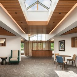 Bradshaw Funeral & Cremation Services & Celebration of Life - The skylit foyer and reception desk at Bradshaw's White Bear Lake funeral home, where families are welcomed