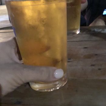 Status Q Billiards - a person holding a glass of beer - Pool Halls Near Me - Brooklyn, New York Status Q Billiards - a person holding a glass of beer - Pool Halls Near Me - Brooklyn, New York