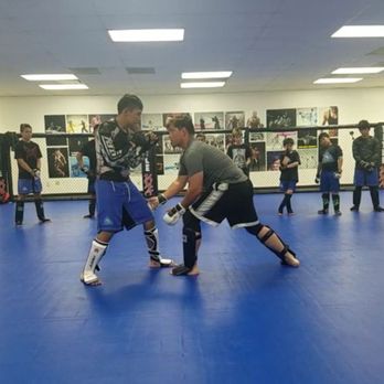 Strength and Honor MMA - Coach Chris with our boy - Martial Arts Near Me - Upland, California Strength and Honor MMA - Coach Chris with our boy - Martial Arts Near Me - Upland, California