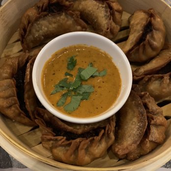 Empyrean Kitchen - Fried Chicken Momo - Spicy sauce in side - Indian Near Me - Hoboken, New Jersey Empyrean Kitchen - Fried Chicken Momo - Spicy sauce in side - Indian Near Me - Hoboken, New Jersey