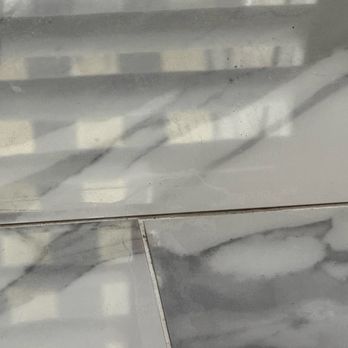 SPS and Contracting - Uneven tile all over my house - Masonry/Concrete Near Me - Georgetown, Texas