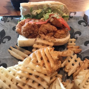 Uncle T's Oyster Bar - Fried Shrimp Po-boy and waffle fries. - Bars Near Me - Scott, Louisiana Uncle T's Oyster Bar - Fried Shrimp Po-boy and waffle fries. - Bars Near Me - Scott, Louisiana