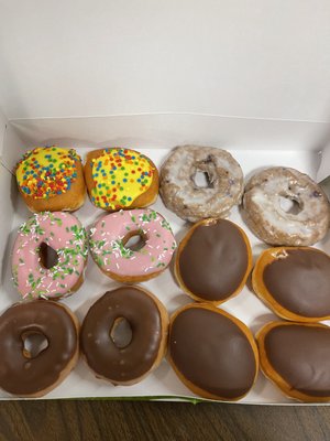 Photo of Krispy Kreme - Elk Grove Village, IL, US. a variety of donuts in a box