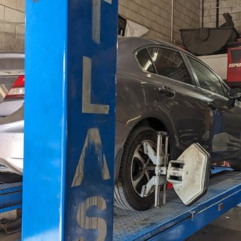 Tirez2day - Getting a wheel alignment done on my Honda Civic at Tirez2day. - Tires Near Me - Pomona, California Tirez2day - Getting a wheel alignment done on my Honda Civic at Tirez2day. - Tires Near Me - Pomona, California