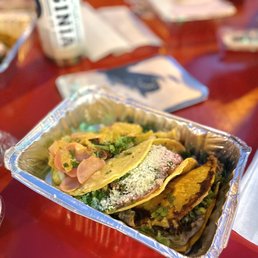 Cod fish, flank and chorizo, birria taco Cod fish, flank and chorizo, birria taco