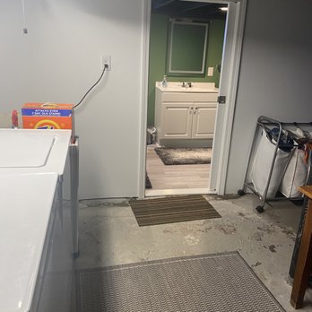 Detroit Build - I actually even fold laundry down here now. We didn't finish the laundry area but if feels less dingy next to the nice bathroom. - General Contractors Near Me - Royal Oak, Michigan